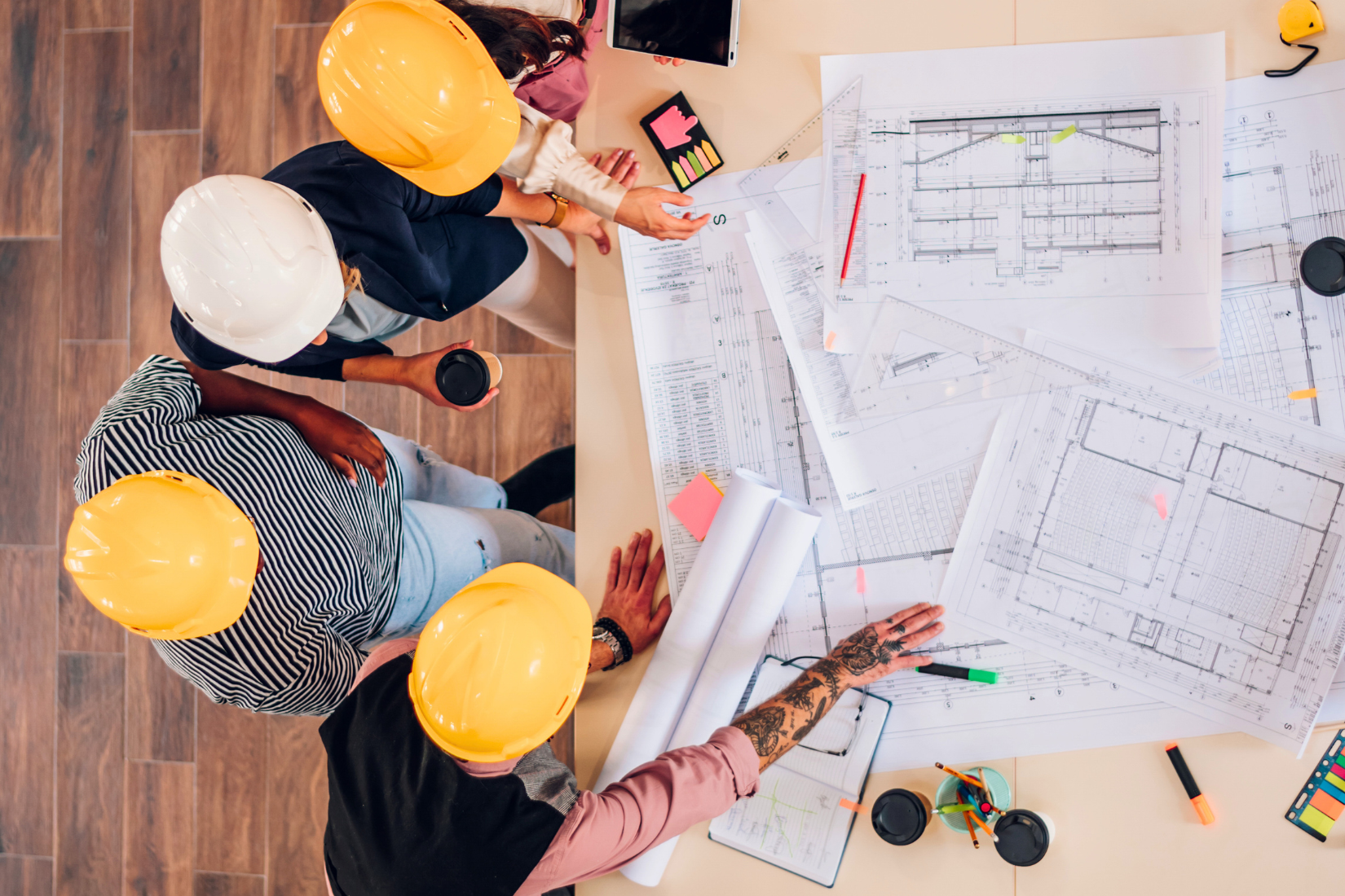 Home construction framing and blueprints representing experienced construction lending support in North Carolina