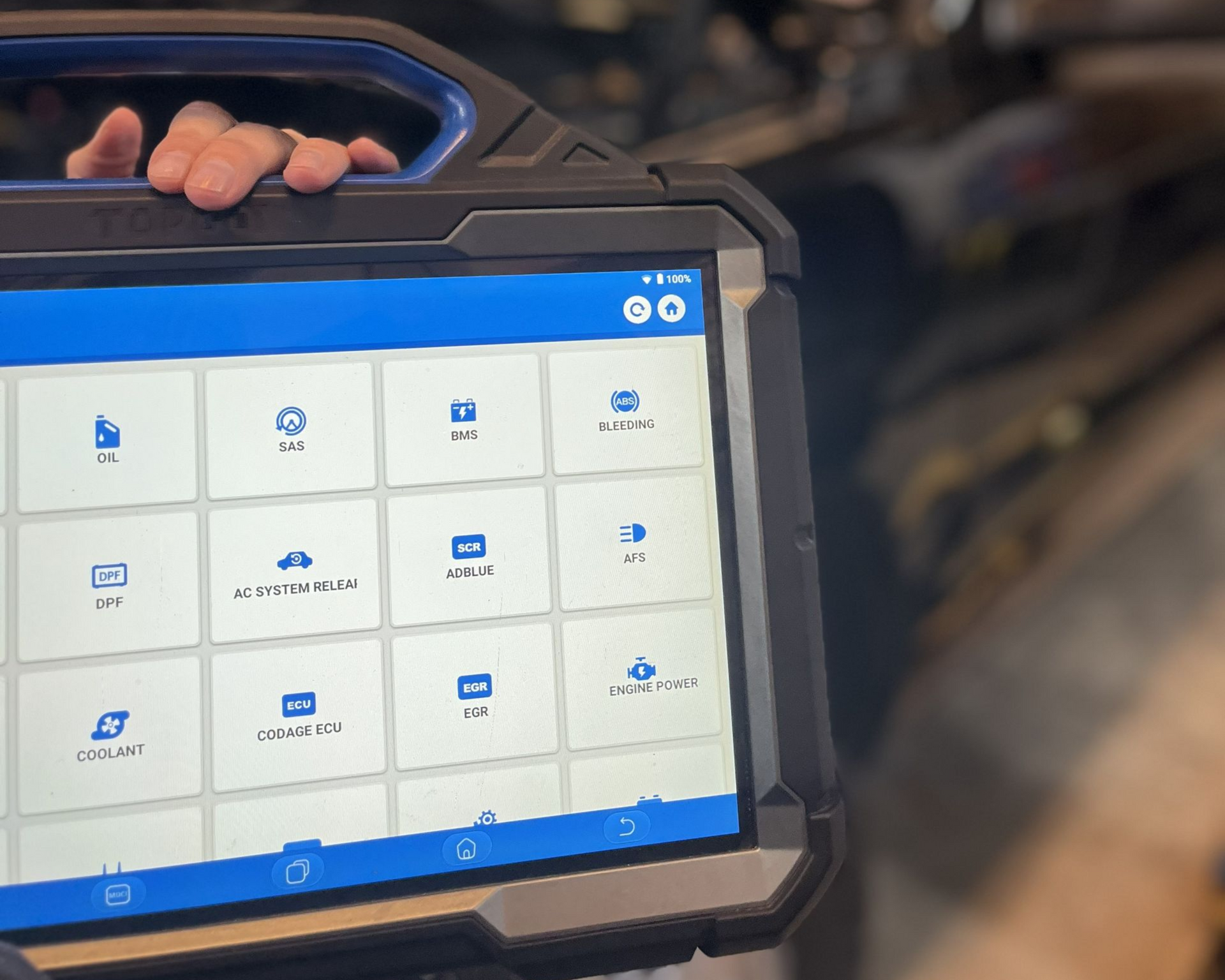 Close up image of a technician performing automotive diagnostics at Beachview Auto Service