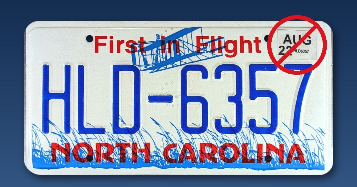 North Carolina License Plate Showing Sticker Crossed Out Due To Chage In DMV Procedures Starting 1 October 2026