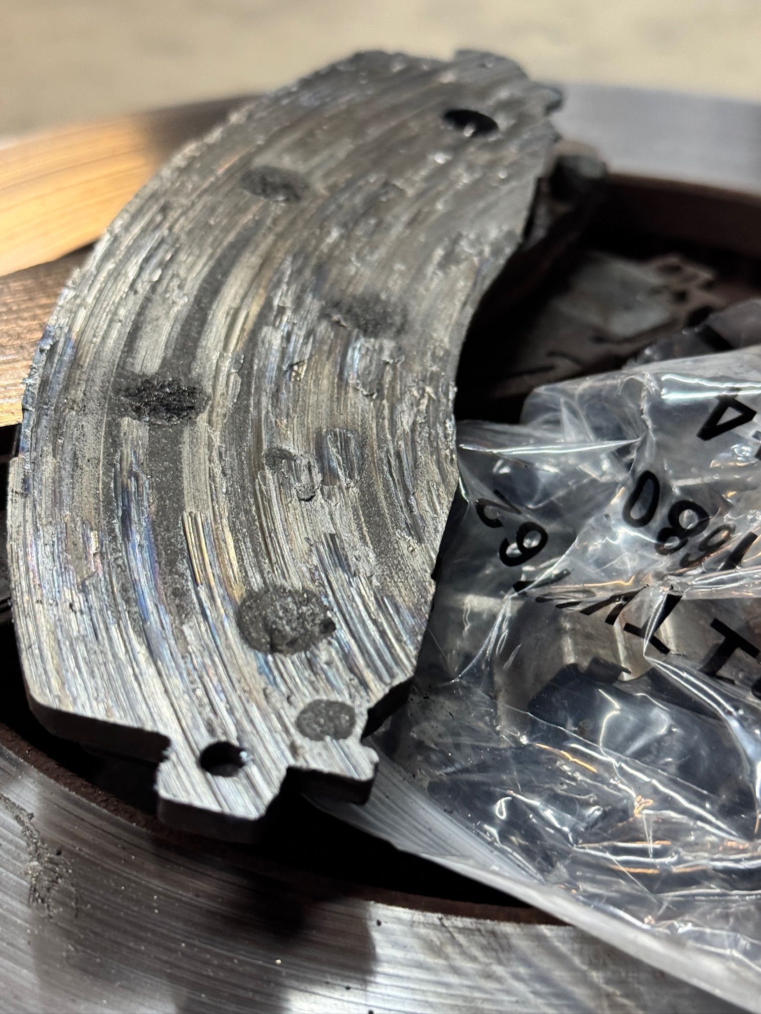 Worn and grooved disk brake pads and rotors found by Beachview Auto Service