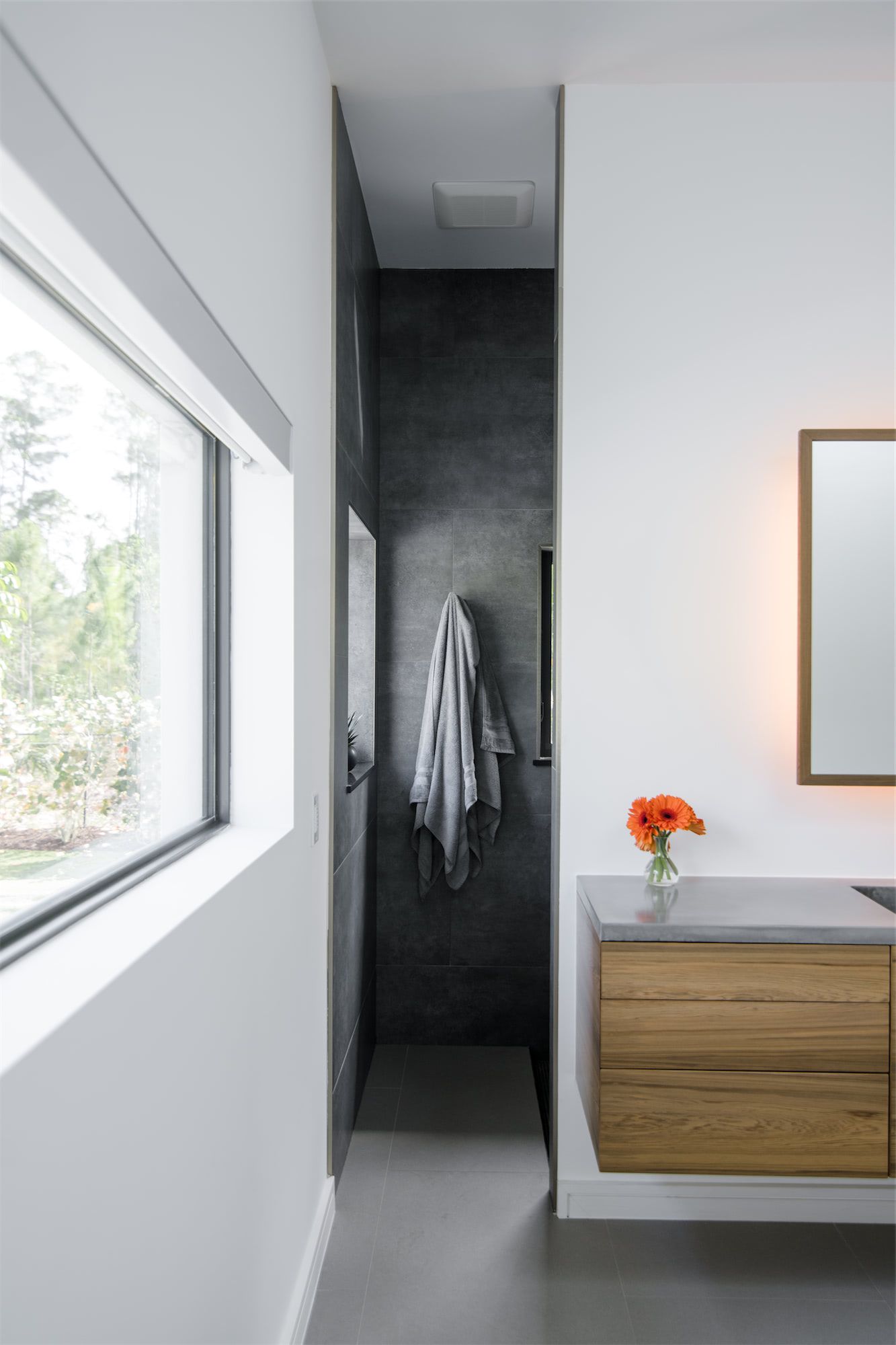 a bathroom with a towel hanging on the wall