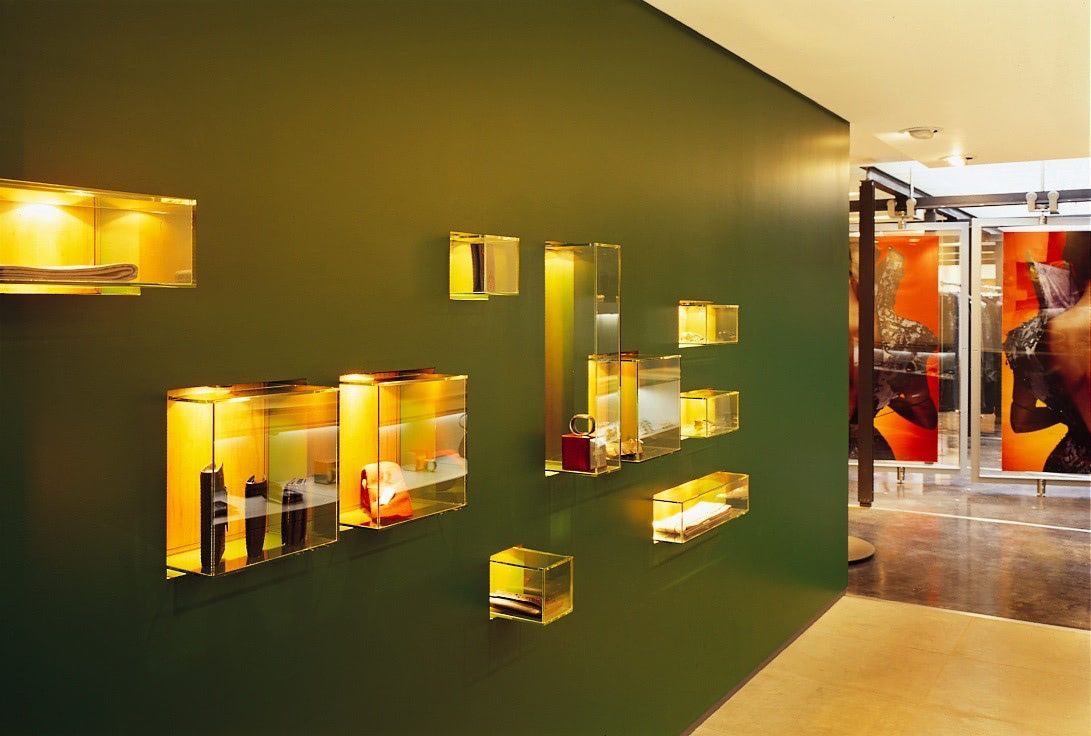 wall of an Alexander McQueen store with light up cubes attached to the wall.