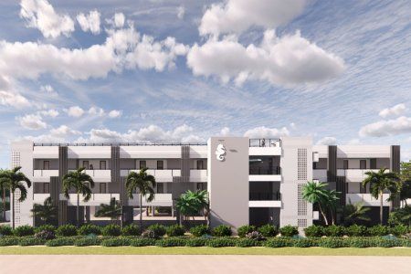 An artist 's impression of a building with palm trees in front of it.