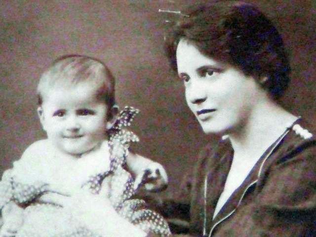 Baby Noemi with Juliska's father behind