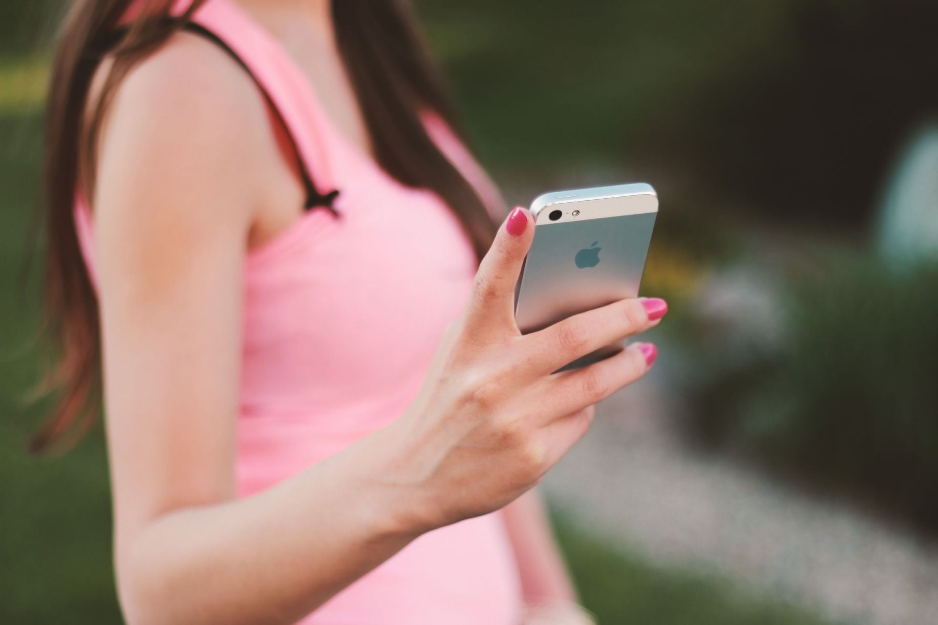 Woman Accessing Telemedicine Services on Smartphone