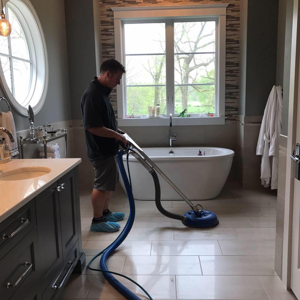 Cleaning Bathroom Floor — Cedar Rapids, IA — Eastern Iowa Carpet Care Inc