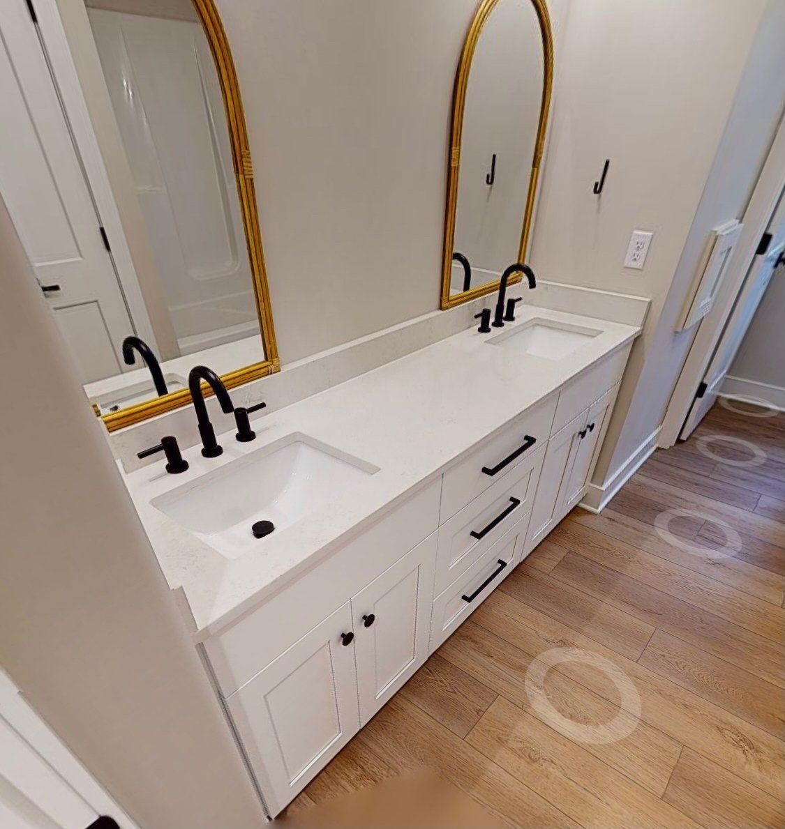 white sink with cabinets