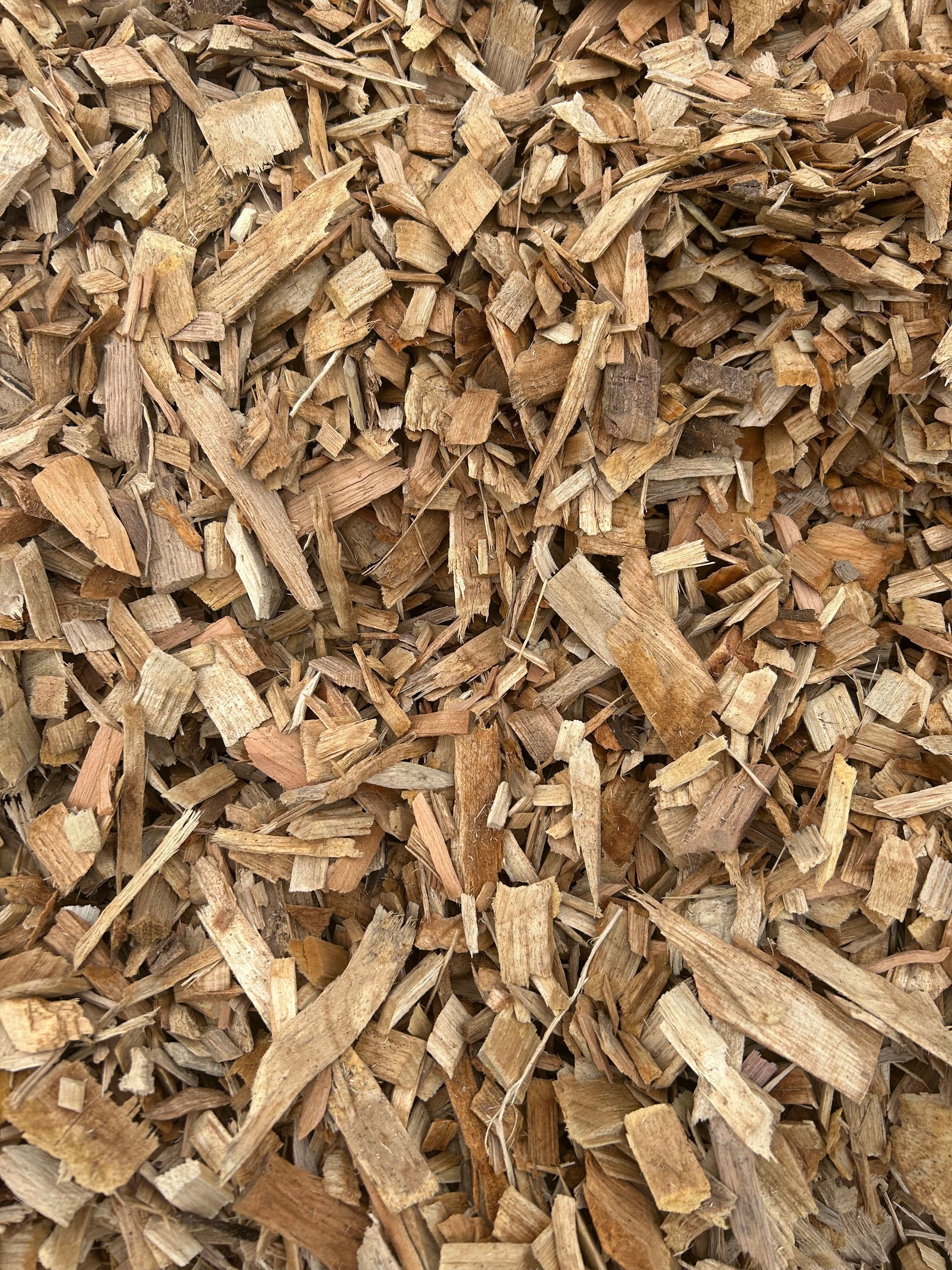 Pile of brown wood chips.