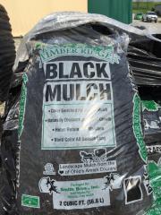 Black mulch bag with green trim,