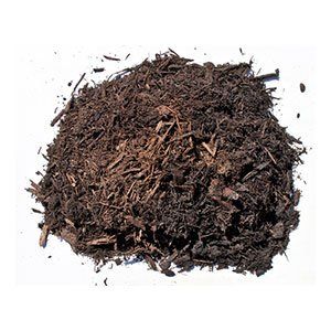 Pile of dark brown mulch on a white background, containing wood chips and decomposed organic matter.