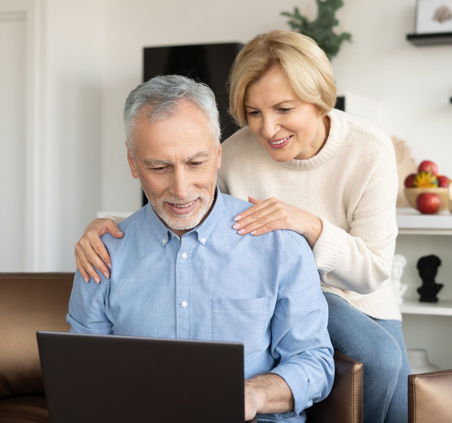 Senior Couple Checking the Laptop — Whitesboro, NY — The Florentino Agency Senior Couple Checking the Laptop — Whitesboro, NY — The Florentino Agency