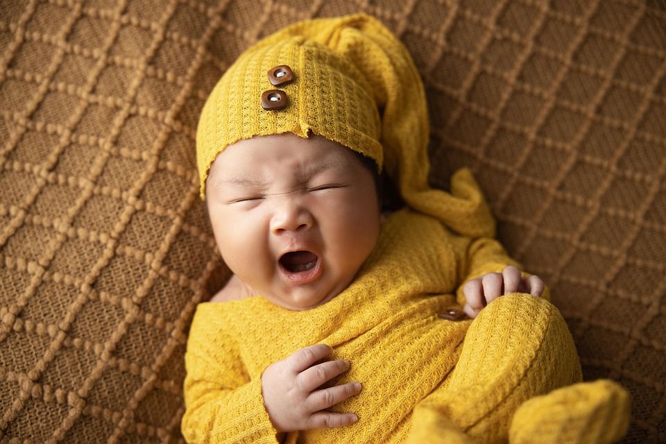 A comfortable and sleepy baby, Manage indoor humidity and comfort with Unified Comfort Systems HVAC in Akron Ohio