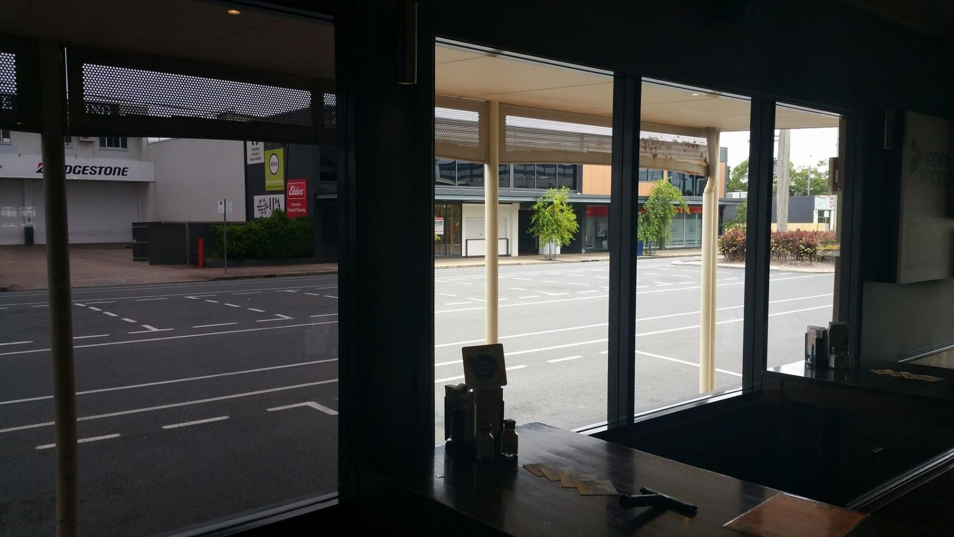 A View of A Street from A Restaurant Window — Epic Window Tinting in Glenella, QLD