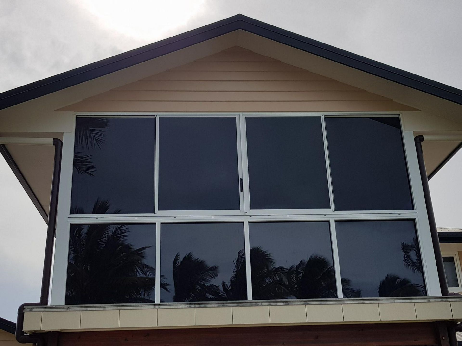 A House with A Balcony and A Lot of Windows — Epic Window Tinting in Glenella, QLD