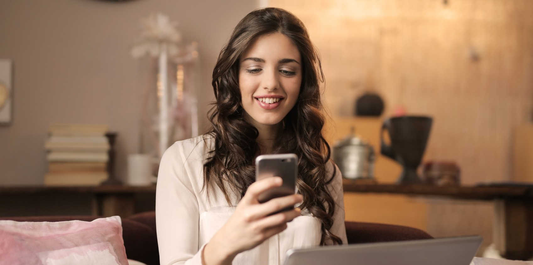 Lady looking at the mobile apps on her phone