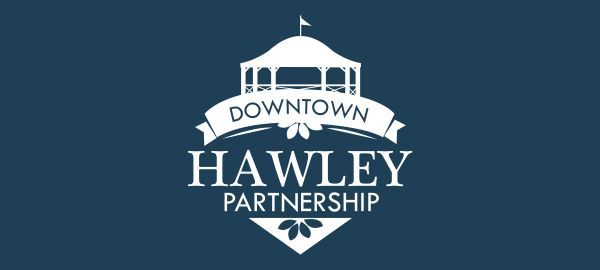 Downtown Hawley Partnership logo in white on a dark blue background