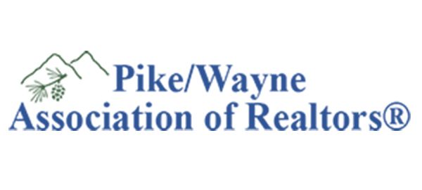 Pike/Wayne Association of Realtors logo with blue text and a small green house icon