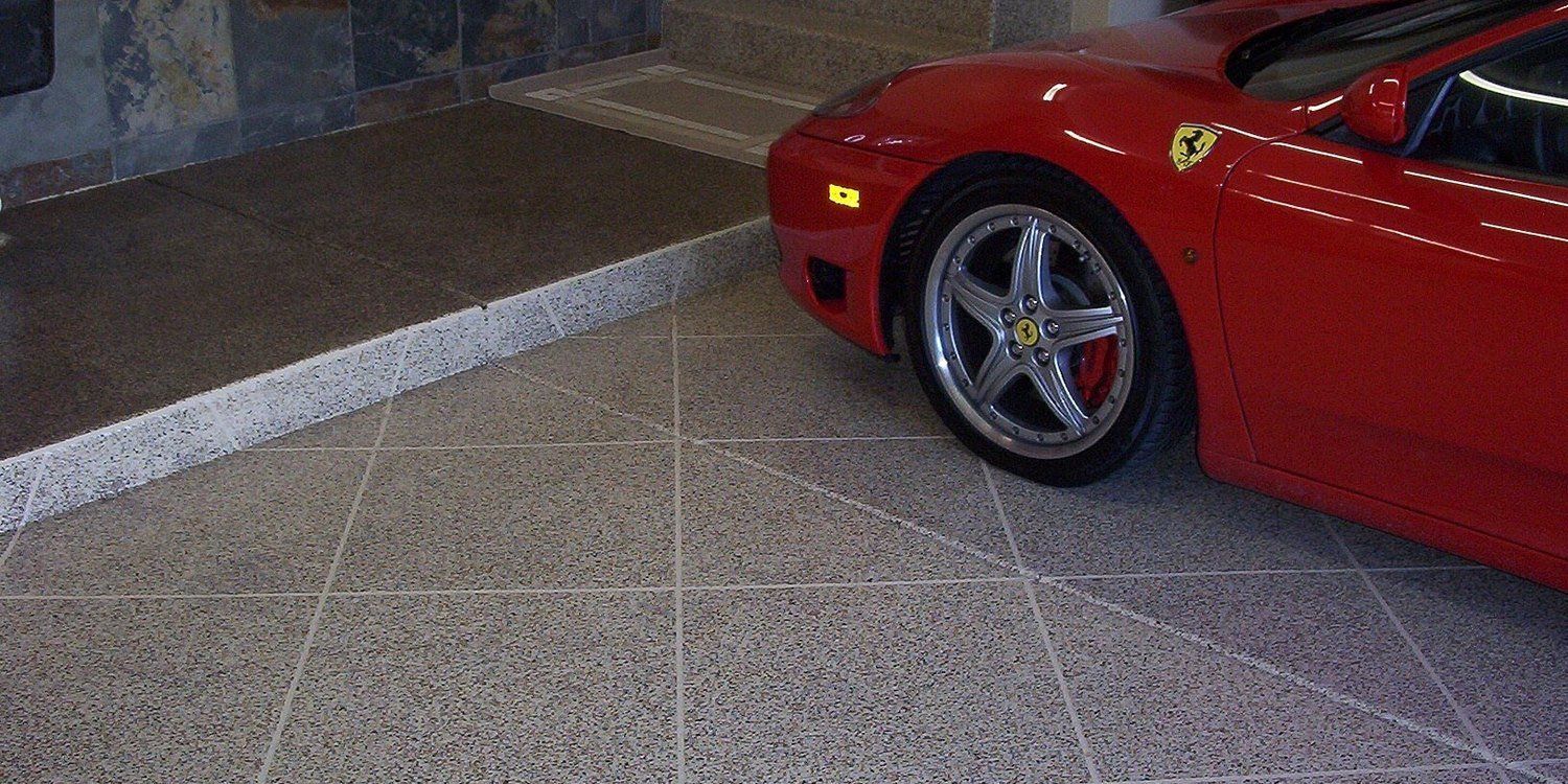 a ferrari on a garage