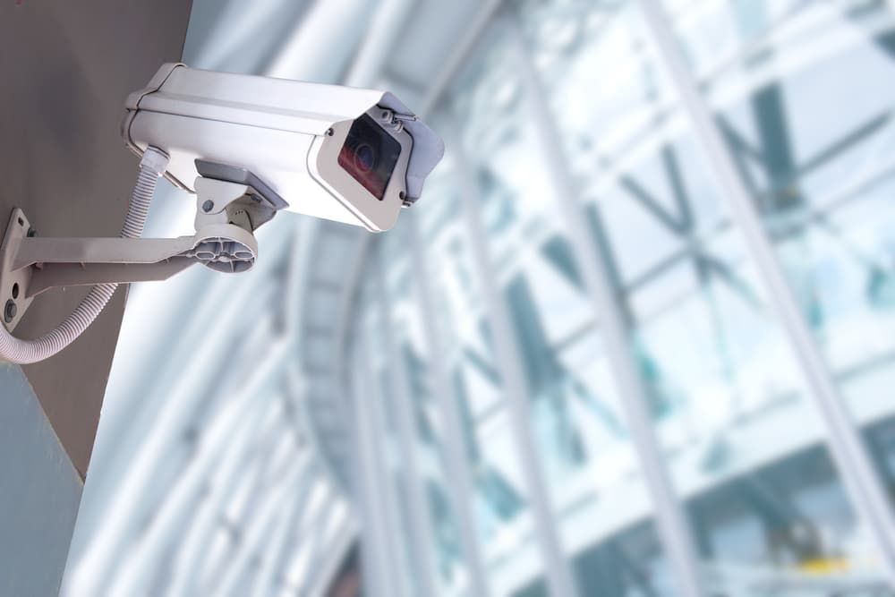 A Security Camera is Mounted on the Side of a Building — BNCC Security Services in Port Macquarie, NSW