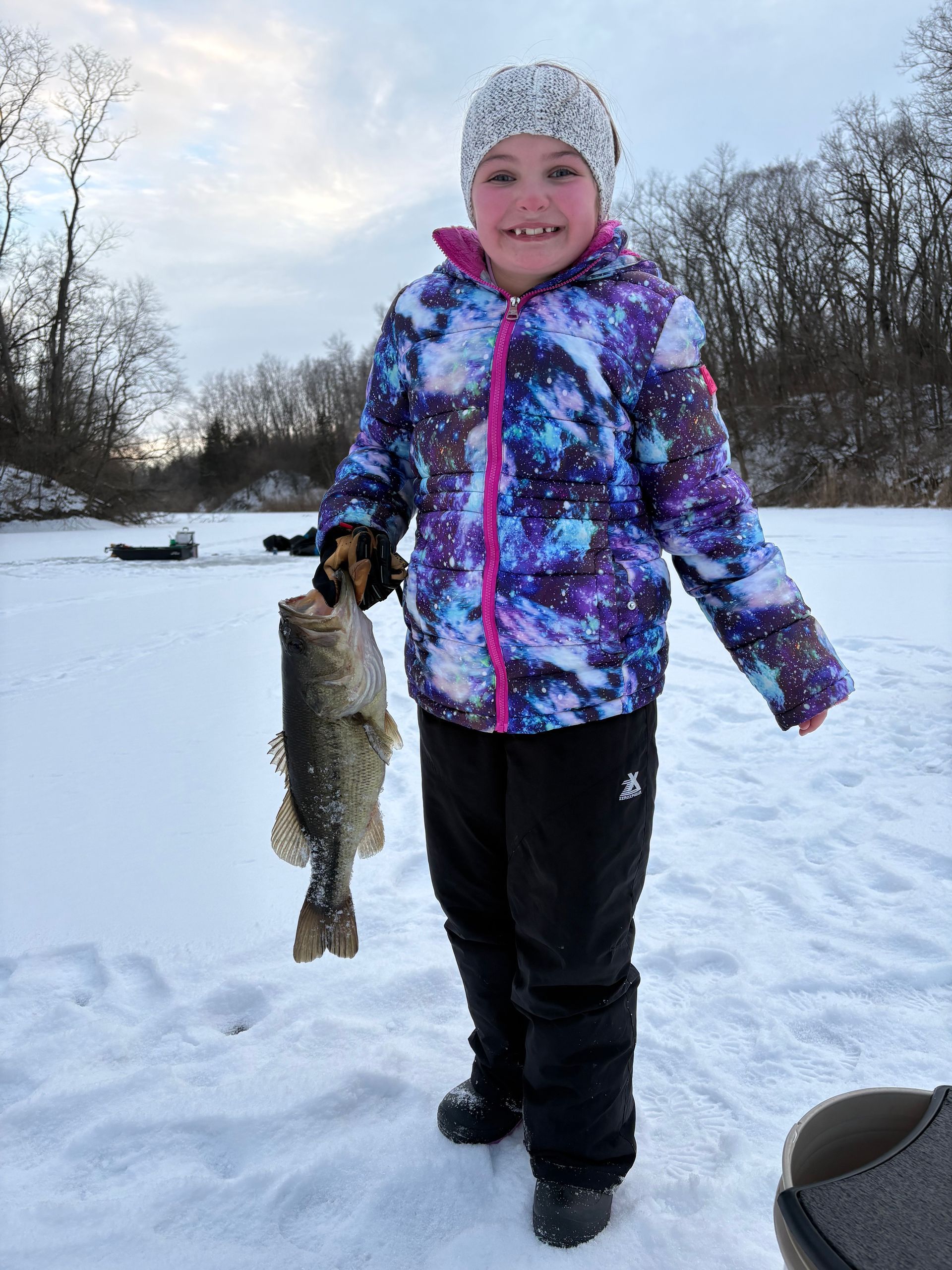  Hailey Kollker, caught a 3.5 lb  bass 
while ice fishing in January 2026.