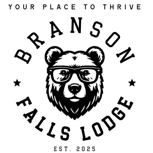 A black and white logo for branson falls lodge