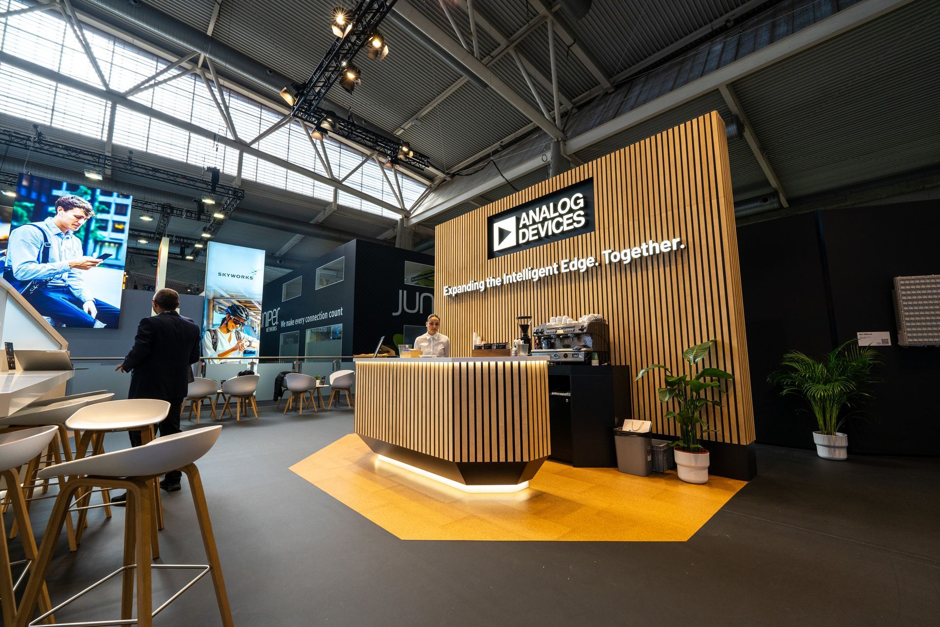 A photograph of the Analog Devices booth at MWC Barcelona