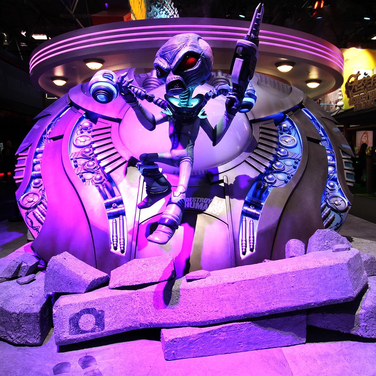 Alien model on purple background at Gamescom