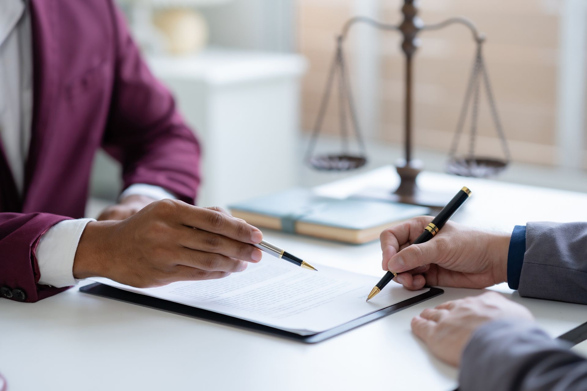 Lawyer discuss the contract document.
