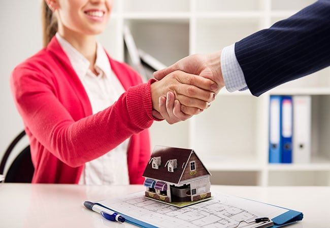 R. Andrew Richner Co., L.P.A. discussing real estate with a client.