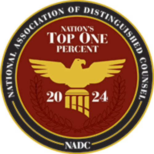 Gold eagle emblem on red badge reading “Nation’s Top One Percent” and “National Association of Distinguished Counsel 2024”