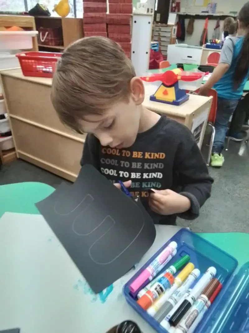 A student wearing a shirt that says 