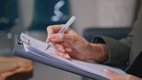 Lady filling out medical forms