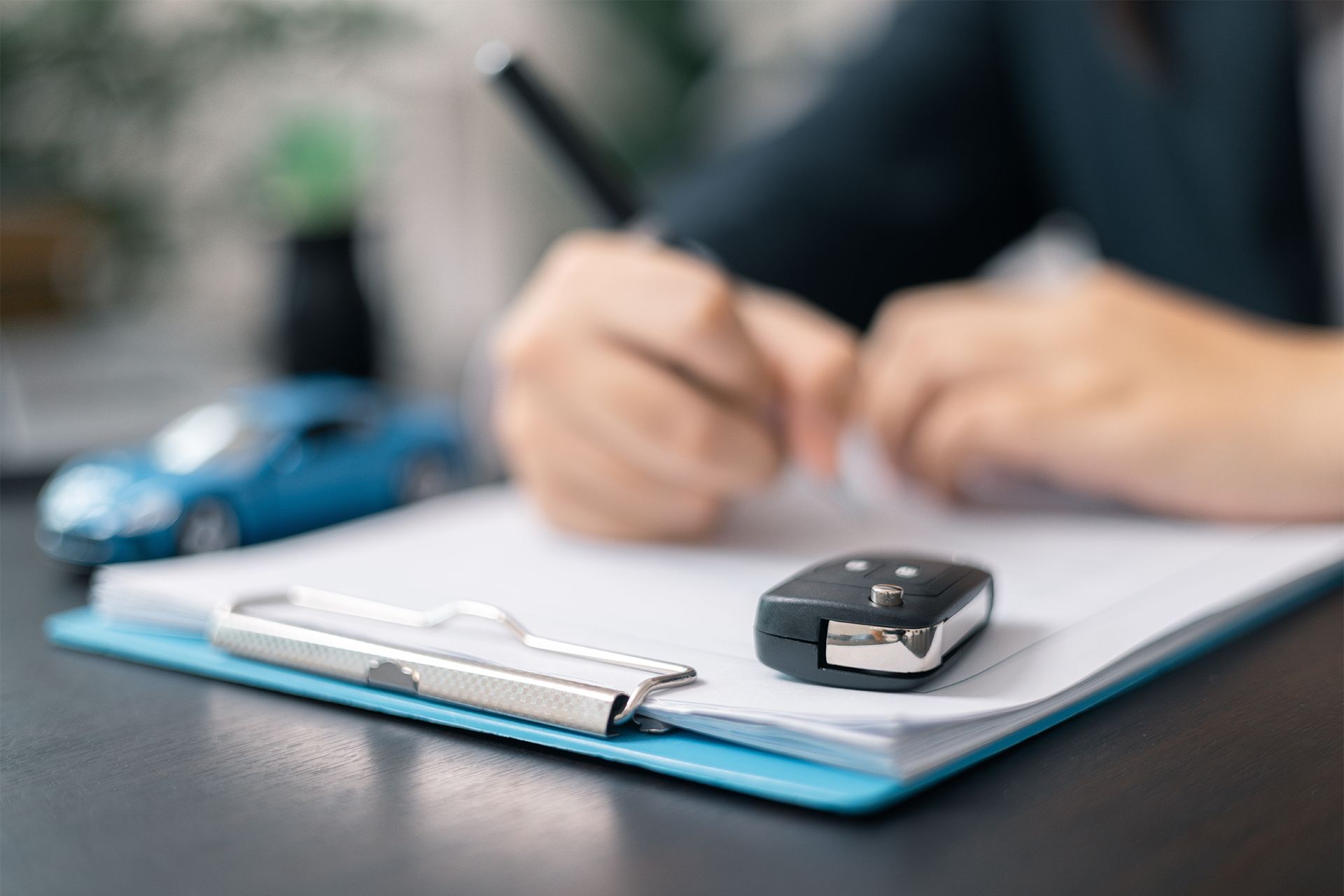 Signing Car Insurance Document