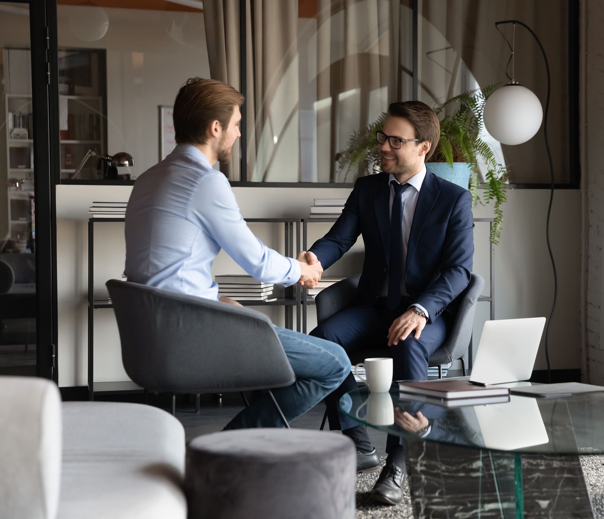 Businessman Shaking Hands With His Insurance Agent