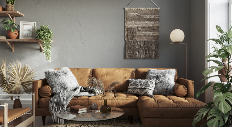 a living room with a brown couch , coffee table , and plants .