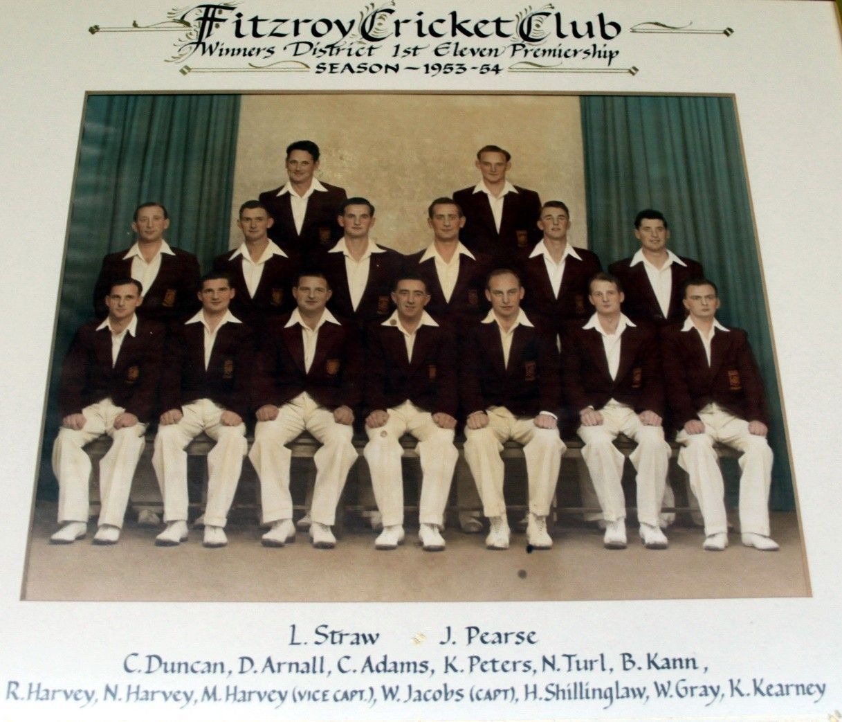 Fitzroy Cricket Club team portrait with players in maroon blazers and white trousers posing in rows