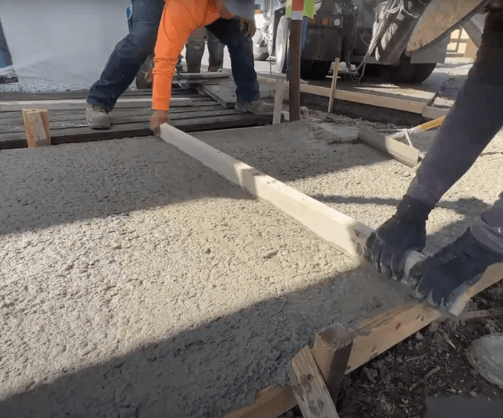 concrete contractor pours slabs for a sidewalk in fairfield, OH