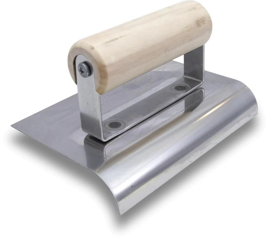 Stainless steel concrete hand edger with wood handle for creating smooth rounded edges.