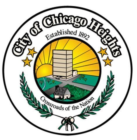 City of Chicago Heights seal featuring sunrise, buildings, stars, and ‘Crossroads of the Nation.’