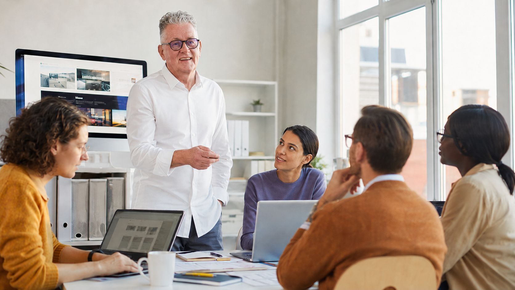 Founder of Pivot2Connect leading a business meeting.