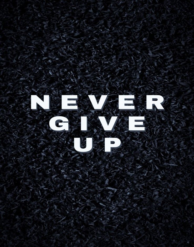A black background with white text that says never give up