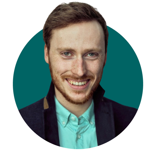 A man with a beard is smiling in a blue circle