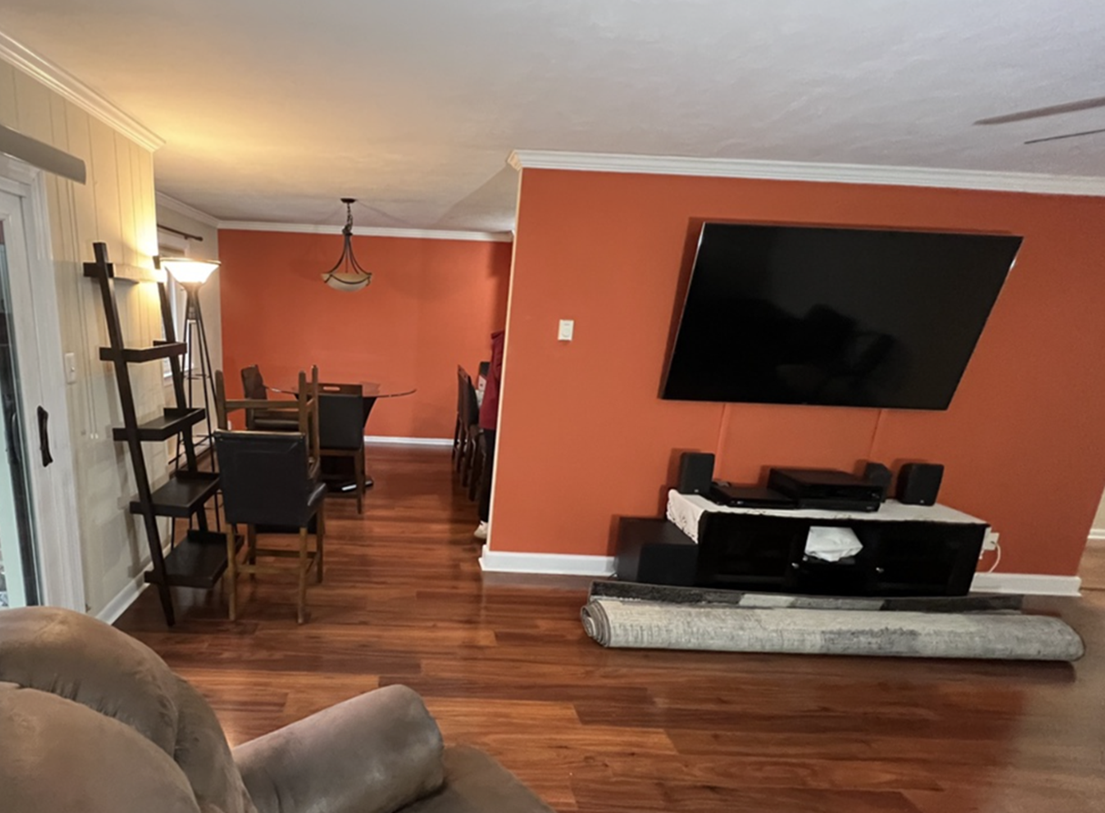 interior paint job by Van Horn Painting in a home in Downingtown PA featuring matte red accent walls with white trim