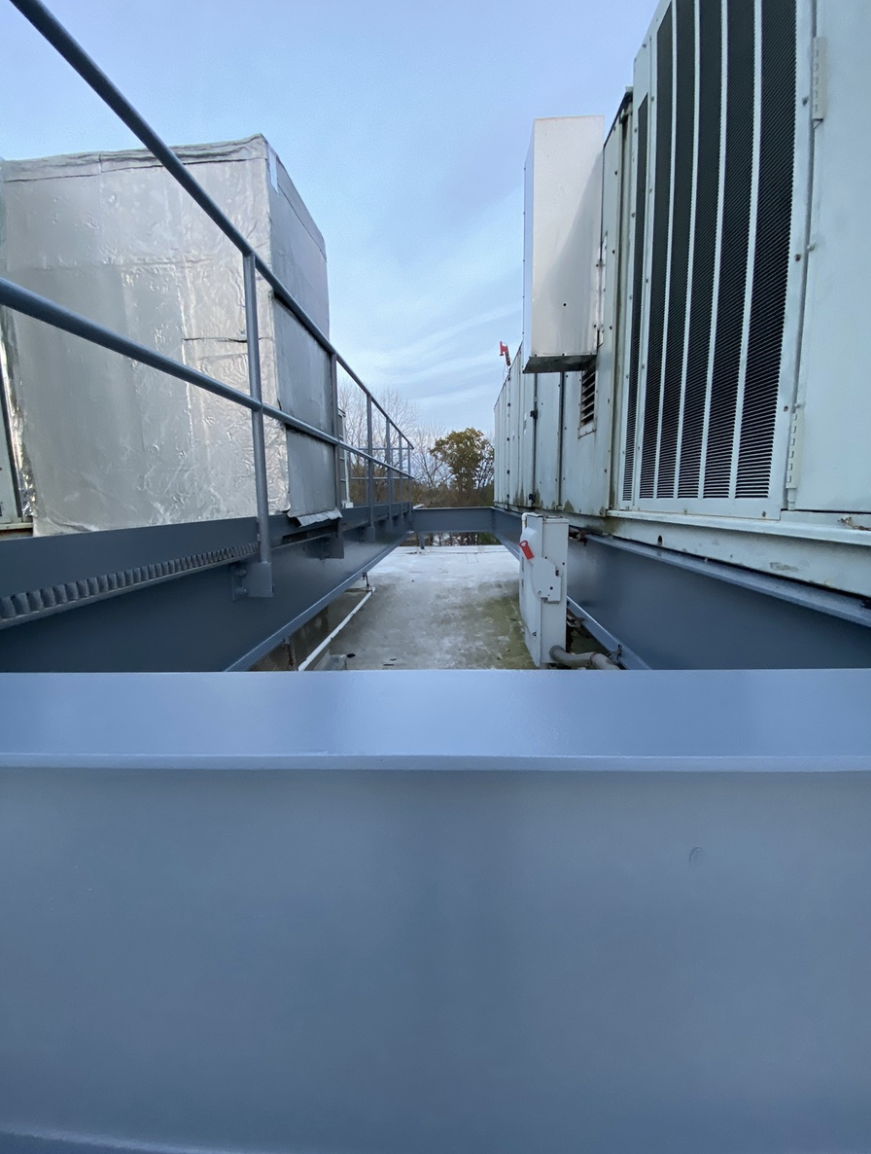 Close up of rooftop steel beam with fresh gray paint in West Chester / Malvern area