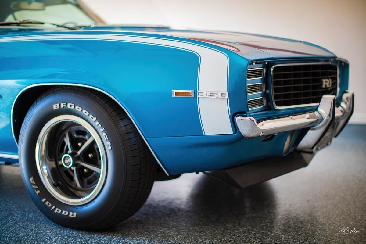 Blue classic car in a garage with epoxy garage floor