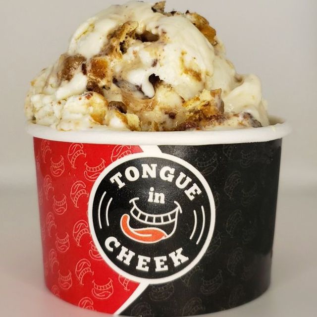 A cup of ice cream from tongue in cheek