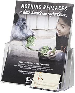 Zoo brochure display with a boy feeding leaves to a monkey, text reading “Nothing replaces a little hands-on experience.”