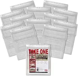 Stack of clear plastic document sleeves, with one labeled “TAKE ONE” in front.