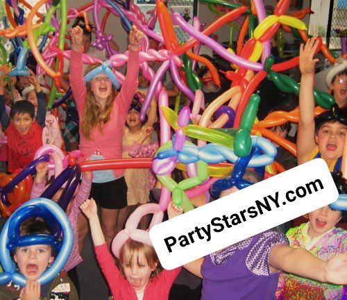 A group of children are playing with balloons and the website partystarsny.com is in the corner