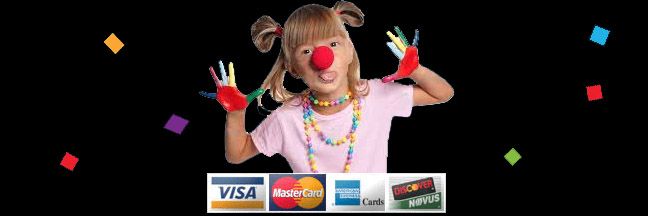 A little girl wearing a clown nose and a pink shirt